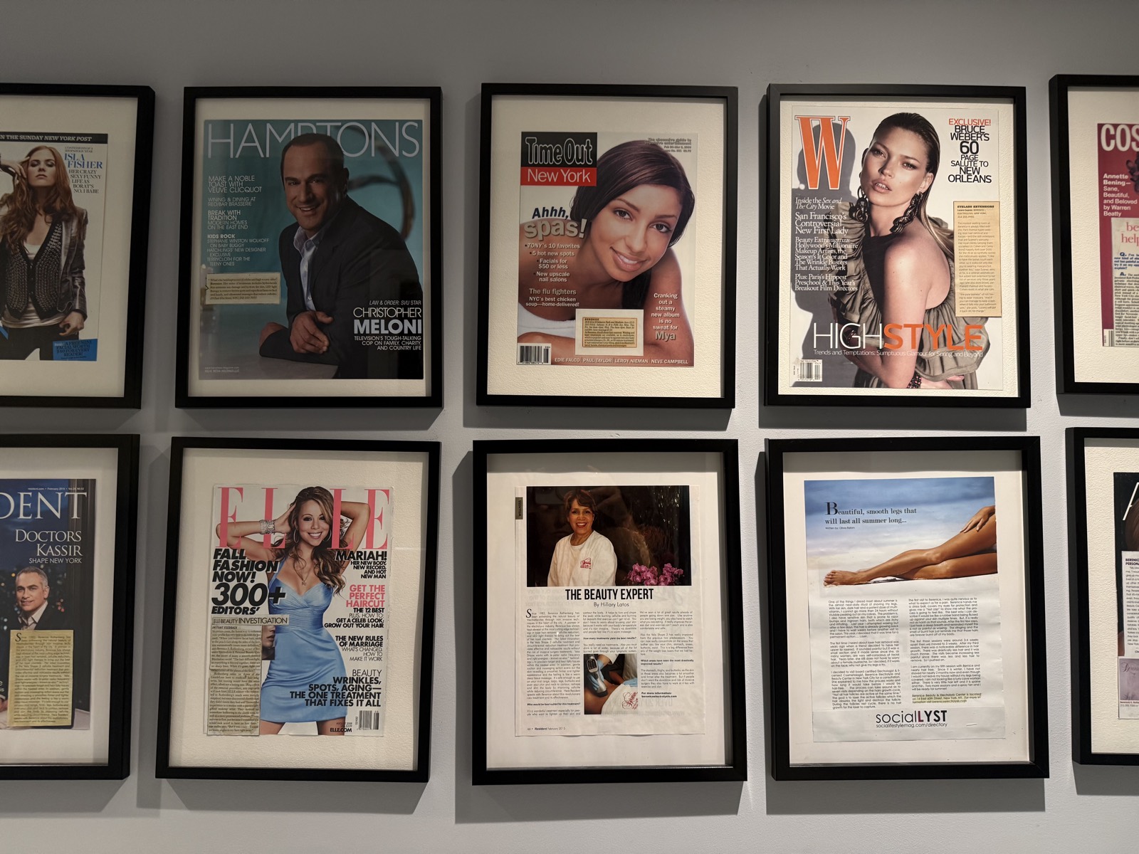 Framed covers of Hamptons, Time Out New York, W and ELLE on the Berenice press wall
